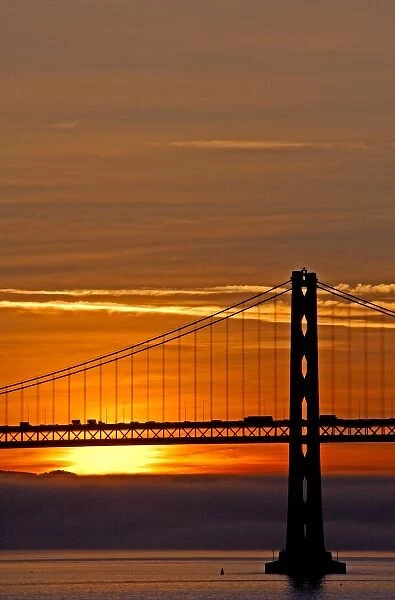 North America, USA, California, San Francisco. Sunrise & fog over the San Francisco Bay Bridge