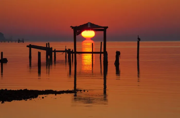 Framed Print : North America; USA; Florida; Apalachicola; Sunrise at an old boat house at Apalachicola Framed Print : North America; USA; Florida; Apalachicola; Sunrise at an old boat house at Apalachicola