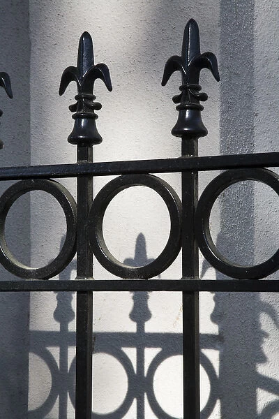 North America, USA, Georgia, Savannah. Wrought iron railing with shadows