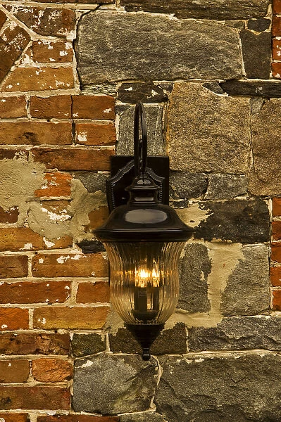 North America; USA; Georgia; Savannah; Lantern on an old building in the Historic
