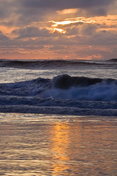 North America; USA; Georgia; Tybee Island; Waves in early morning light
