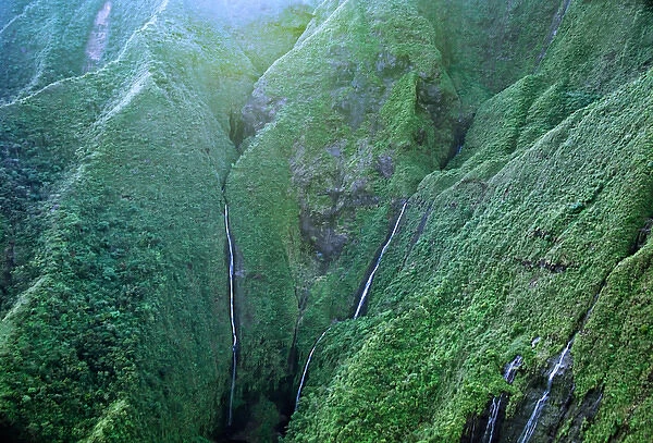 North America, USA, Hawaii, Kauai. Waterfalls on the slopes of Mt. Wai ale ale