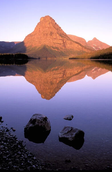 North America, USA, Montana, Glacier National Park. Sinopah Mountain reflected in