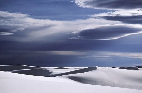 North America, USA, New Mexico. Storm clouds over White Sands National Monument