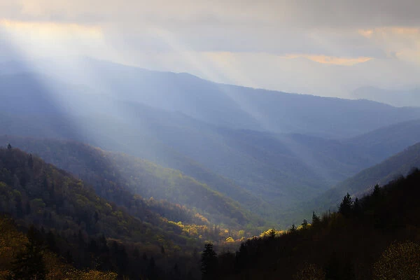 North America, USA, North Carolina; Rays of light over mountain valley in the Smokies