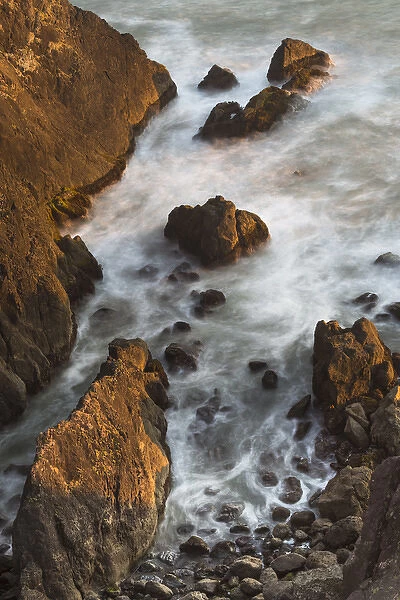 North America, USA, Oregon. Slow shutter speed looking down from cliff overlooking ocean, Samuel H