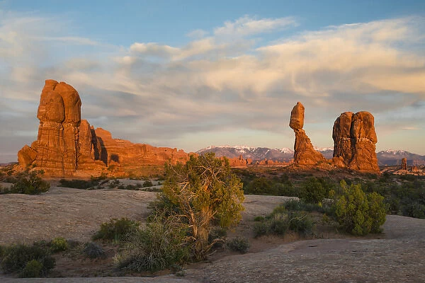 North America, USA, Utah, Arches National Park. Balanced Rock with clouds at sunset