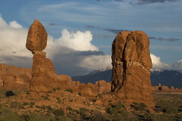 North America, USA, Utah, Arches National Park. Balanced Rock with clouds at sunset