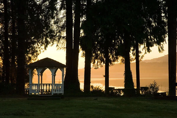 North America, USA, WA, Olympic National Park. Quinault Lodge lake front at sunset