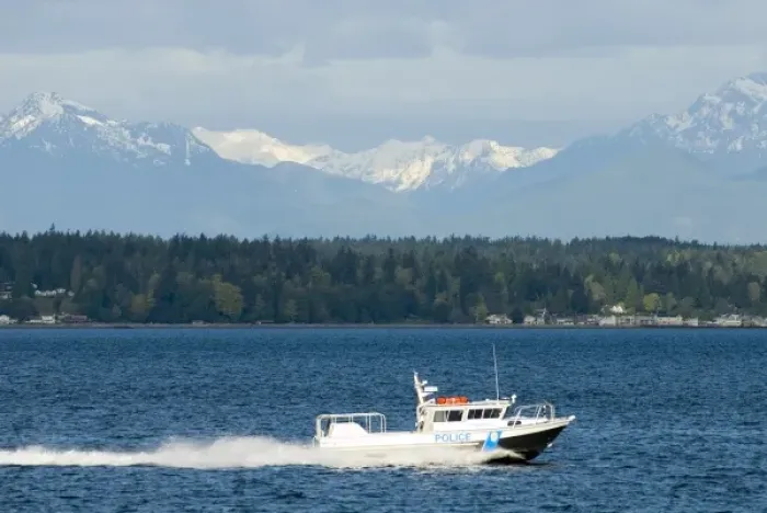 Framed Print : North America, USA, WA, Olympic Peninsula. Police escort for Victoria Clipper ferry Framed Print : North America, USA, WA, Olympic Peninsula. Police escort for Victoria Clipper ferry
