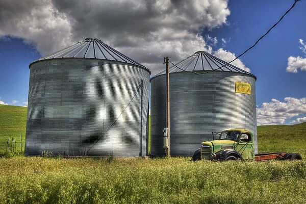 North America; USA; Washinton; Palouse Countyr; Silos with Old Field Truck