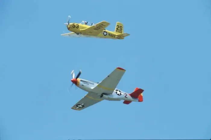 Framed Print : North American P-51C Tuskegee Airmen Red Tail and T-34C Turbo Mentor flying in the sky Framed Print : North American P-51C Tuskegee Airmen Red Tail and T-34C Turbo Mentor flying in the sky
