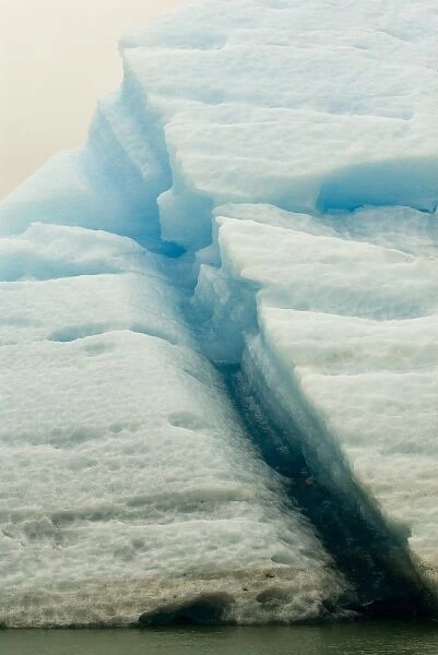 NorthAmerica, USA, AK, Inside Passage. Waterline cleft in upended iceberg