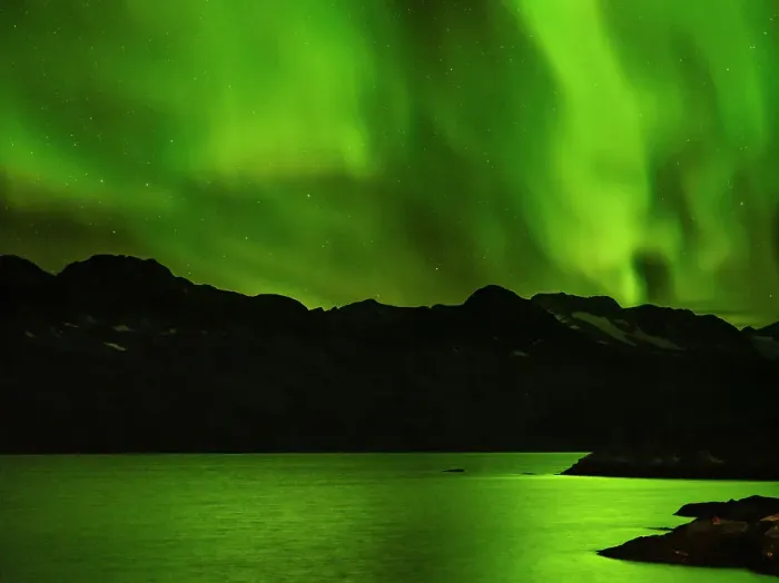 Framed Print : Northern lights over Angmagssalik Fjord near settlement Kuummiit. Ammassalik area in East Greenland, Danish Territory Framed Print : Northern lights over Angmagssalik Fjord near settlement Kuummiit. Ammassalik area in East Greenland, Danish Territory