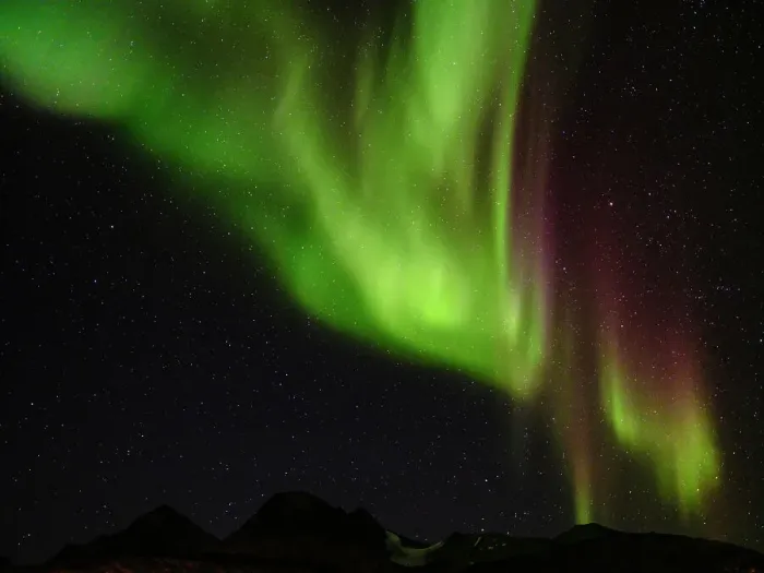Framed Print : Northern Lights over Angmagssalik Fjord near settlement Kuummiit (formerly spelled Kummiut). Ammassalik area in East Greenland, Danish Territory