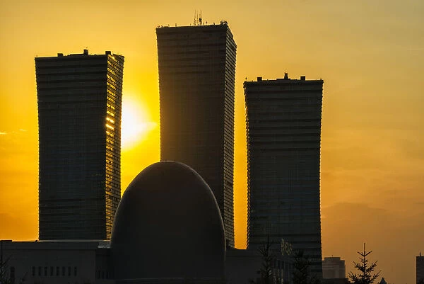 Northern Lights apartment buildings and egg-shaped building of National Archive at sunset