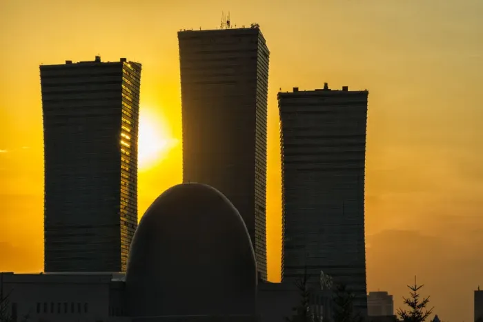 Framed Print : Northern Lights apartment buildings and egg-shaped building of National Archive at sunset