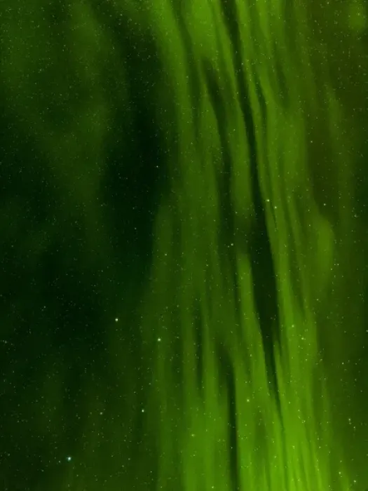 Framed Print : Northern Lights or aurora borealis near Hoefn, over the mountains of Vatnajoekull NP during Winter
