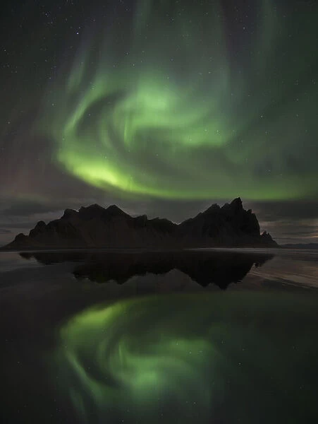 Northern Lights above Vestrahorn beach near Hofn in the southeast of Iceland