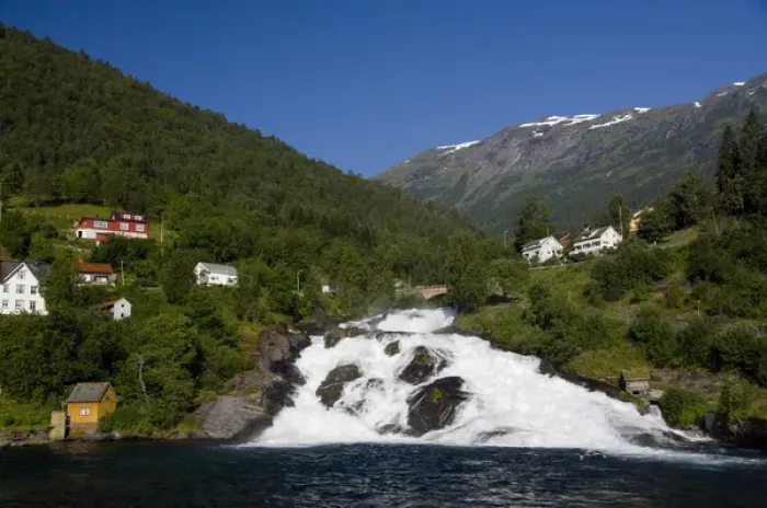 Framed Print : Norway, Hellesylt. Waterfall that spills into Geirangerfjord at the port city of