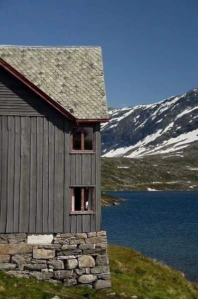 Norway. Scenic byway 63 between Geiranger & Hellesylt. Djupvasshytta Mountain Lodge and lake