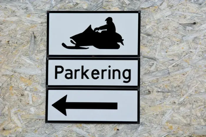 Framed Print : Norway. Svalbard. Longyearbyen. Snowmobile parking sign