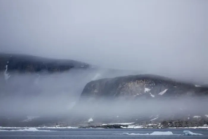 Framed Print : Norway, Svalbard, Nordaustlandet, Cliffs rise above sea ice in fog along Scoresby Framed Print : Norway, Svalbard, Nordaustlandet, Cliffs rise above sea ice in fog along Scoresby