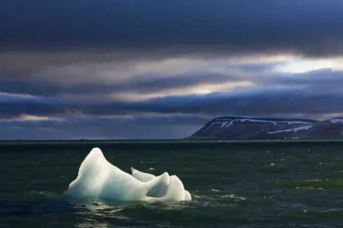 Framed Print : Norway, Svalbard, Nordaustlandet, Setting sun lights iceberg floating in Palanderbukta Framed Print : Norway, Svalbard, Nordaustlandet, Setting sun lights iceberg floating in Palanderbukta