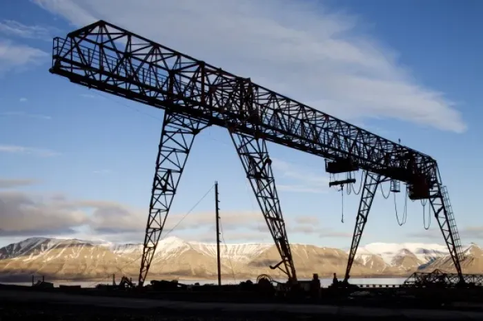Framed Print : Norway, Svalbard, Pyramiden, Silhouette of loading crane along waterfront at abandoned
