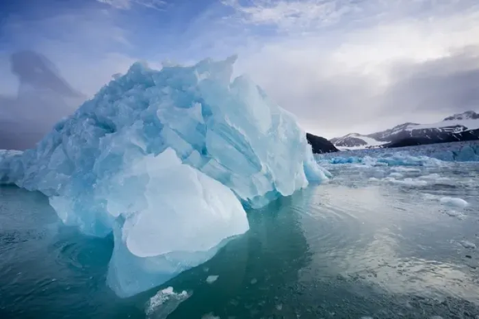 Framed Print : Norway, Svalbard, Spitsbergen Island, Deep blue icebergs floating near face of Sveabreen