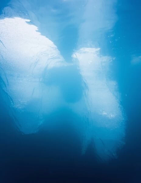 Norway, Svalbard, Spitsbergen, Underwater view of iceberg floating near face of Lilliehook