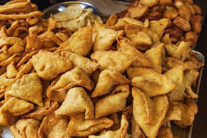 Framed Print : Nowhatta, Srinagar, Jammu and Kashmir, India. Fried samosas at a market in Srinagar Framed Print : Nowhatta, Srinagar, Jammu and Kashmir, India. Fried samosas at a market in Srinagar
