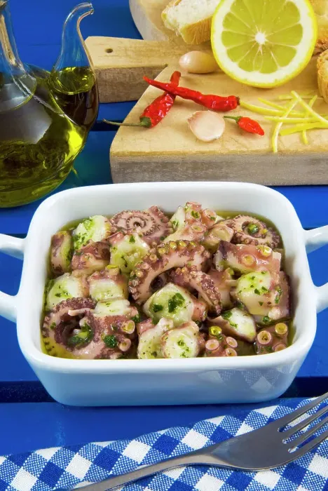 Framed Print : Octopus salad (made with boiled octopus, olive oil, lemon, garlic, chili, parsley, pepper, salt) Framed Print : Octopus salad (made with boiled octopus, olive oil, lemon, garlic, chili, parsley, pepper, salt)