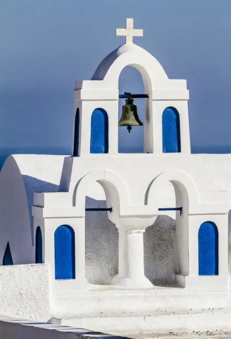 Framed Print : Oia, Greece. Greek Orthdox Church steeple, cross, bell, and blue arches against Aegean Framed Print : Oia, Greece. Greek Orthdox Church steeple, cross, bell, and blue arches against Aegean