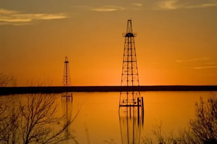 Framed Print : Oil well derricks in Lake Arrowhead near Wichita Falls, Texas, USA at sunset, winter Framed Print : Oil well derricks in Lake Arrowhead near Wichita Falls, Texas, USA at sunset, winter