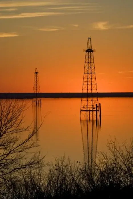 Framed Print : Oil well derricks in Lake Arrowhead near Wichita Falls, Texas, USA at sunset, winter Framed Print : Oil well derricks in Lake Arrowhead near Wichita Falls, Texas, USA at sunset, winter