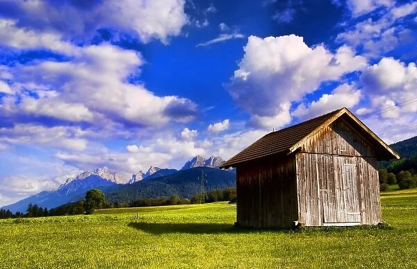 Old barn in farm with fabulous Dolomites mountains behind in Niederdorf Italy near