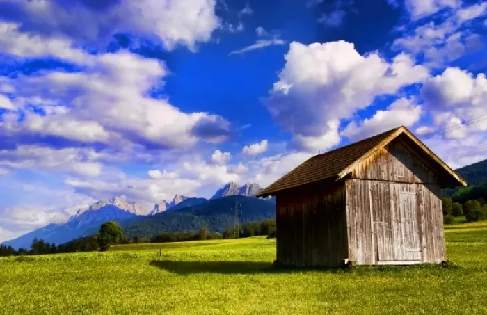 Framed Print : Old barn in farm with fabulous Dolomites mountains behind in Niederdorf Italy near Framed Print : Old barn in farm with fabulous Dolomites mountains behind in Niederdorf Italy near