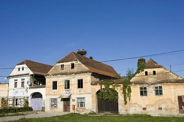 Old buildings in Prejmer (Tartlau) in Transsilvania with stork nest Europe, Eastern Europe