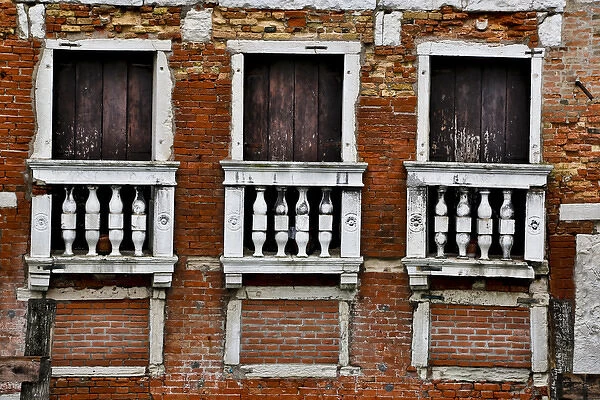Old and colorful doorways and windows in Venice Italy