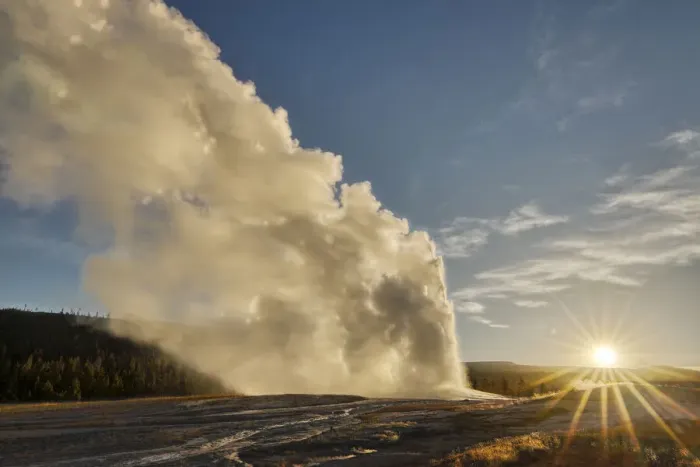 Framed Print : Old Faithful erupting at sunrise, Yellowstone National Park, Montana, USA Framed Print : Old Faithful erupting at sunrise, Yellowstone National Park, Montana, USA