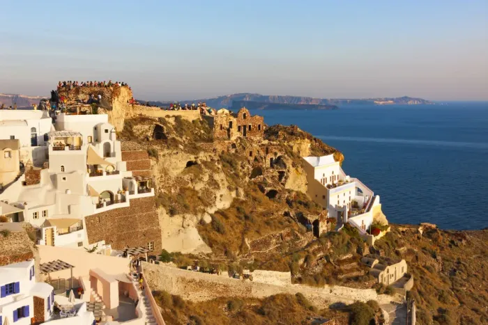 Framed Print : Old fortress and houses on the coast of Aegean Sea. Oia, Santorini Island, Greece Framed Print : Old fortress and houses on the coast of Aegean Sea. Oia, Santorini Island, Greece