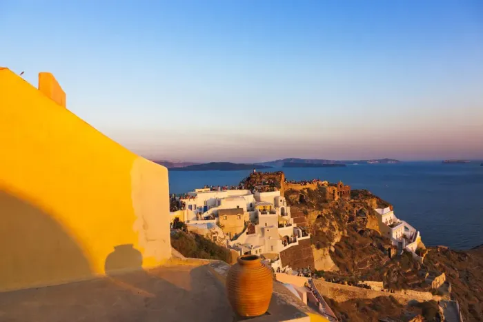 Framed Print : Old fortress and houses on the coast of Aegean Sea. Oia, Santorini Island, Greece Framed Print : Old fortress and houses on the coast of Aegean Sea. Oia, Santorini Island, Greece