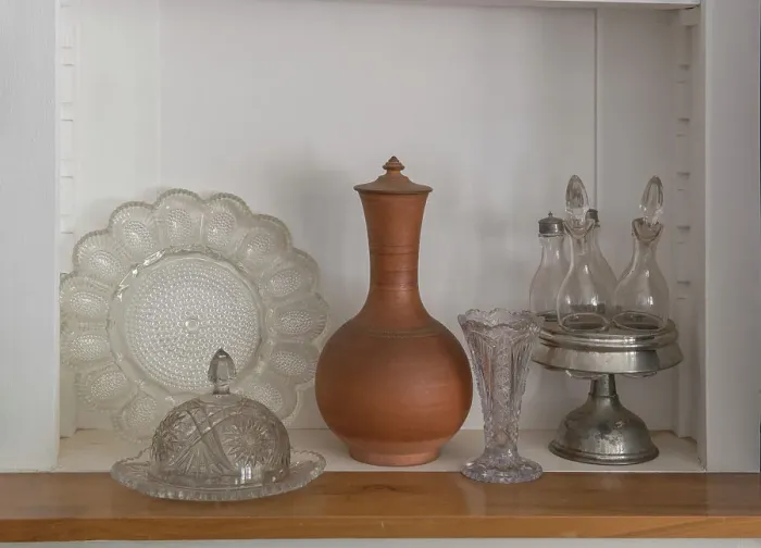 Framed Print : Old glass and serving ware in a ghost town