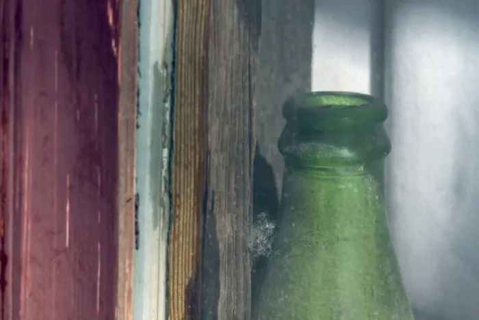 Framed Print : Old green bottle in window, California