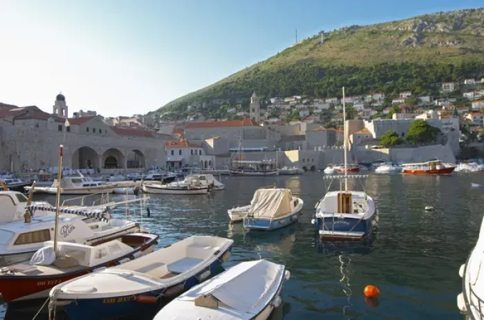 Framed Print : The old harbour with small fishing and pleasure boats. The Arsenal and the SRD hill