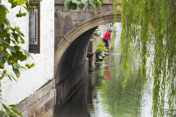 Old house and stone bridge on the Grand Canal, Shaoxing, Zhejiang Province, China