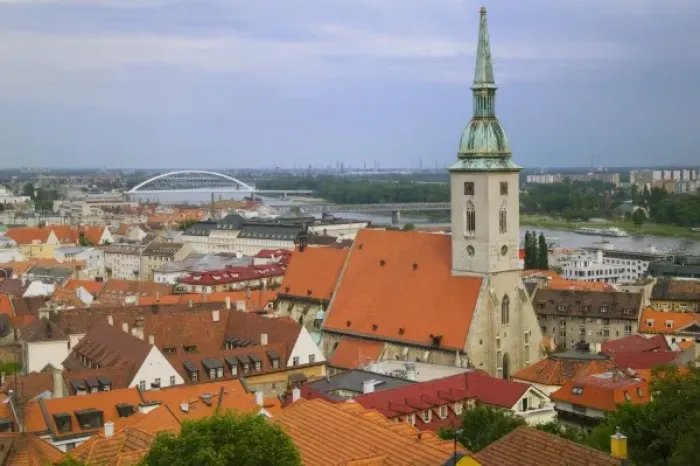 Framed Print : Old town dominated by St. Martins Cathedral, suspension bridge over Danube River Framed Print : Old town dominated by St. Martins Cathedral, suspension bridge over Danube River