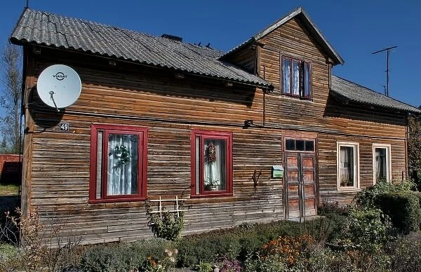 Old traditional wooden house in Marijampole in country near Vilnius, Lithuania