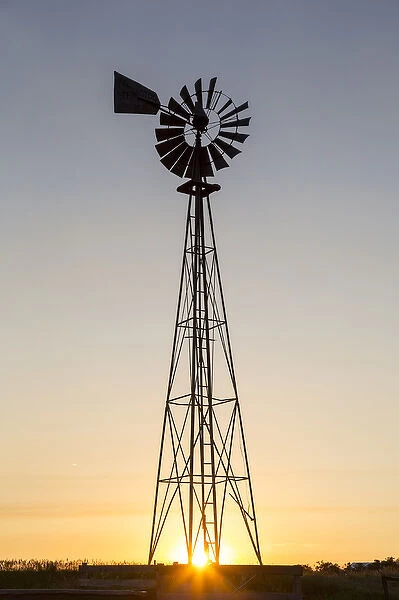 Old windmill at sunset near New England, North Dakota, USA